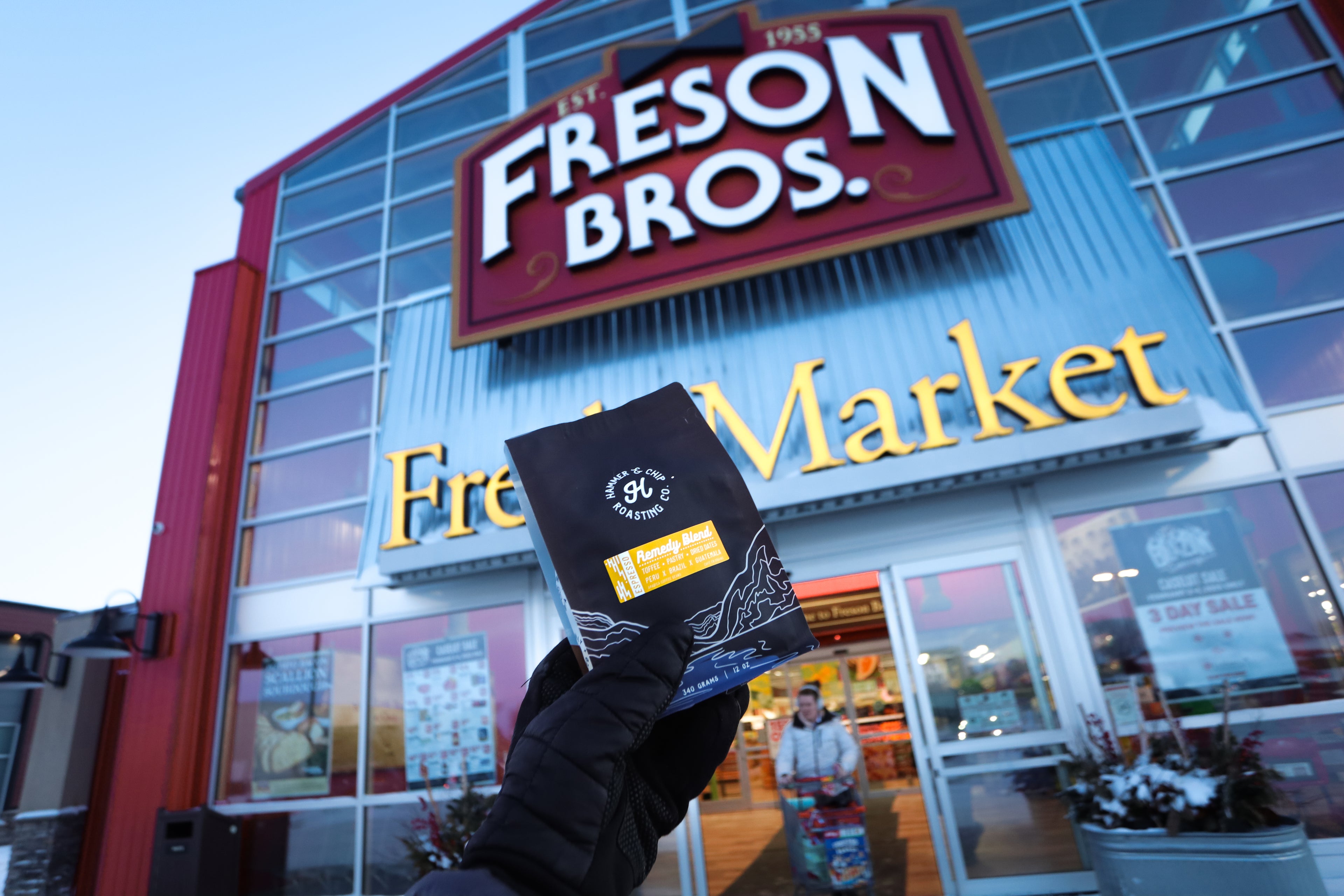 Photo of coffee bag in front of grocery store